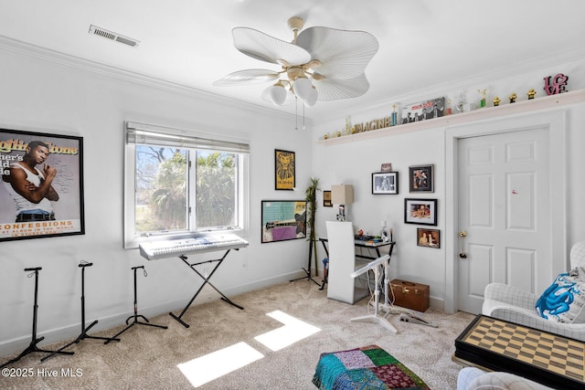 bedroom with ceiling fan, baseboards, ornamental molding, carpet flooring, and visible vents