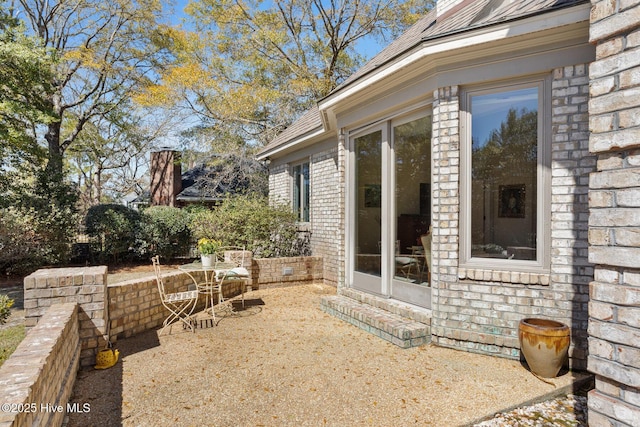 view of patio featuring outdoor dining area