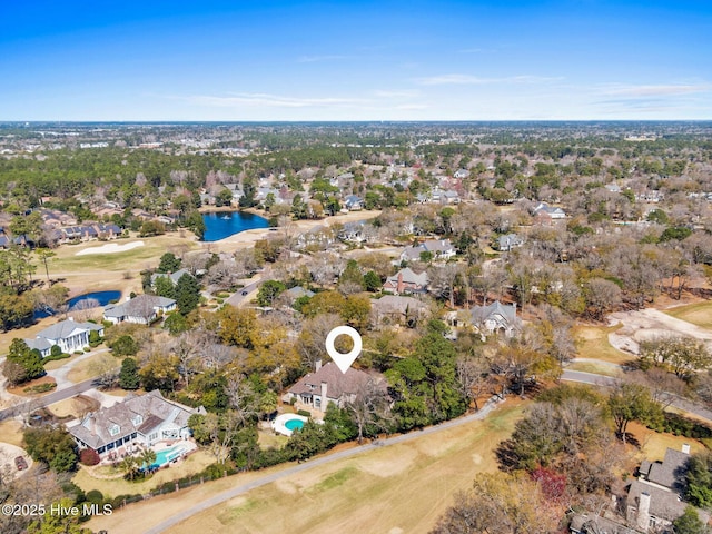 bird's eye view with view of golf course and a residential view