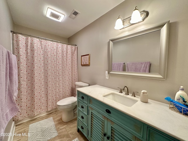 full bathroom with a shower with shower curtain, visible vents, toilet, and vanity