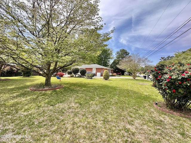 view of yard with an attached garage