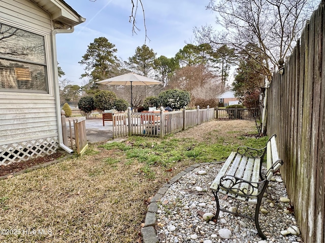 view of yard featuring a fenced backyard
