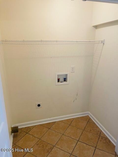305 Comanche Trl, Havelock, NC 28532 - washroom featuring hookup for a washing machine, hookup for an electric dryer, light tile patterned flooring, and baseboards