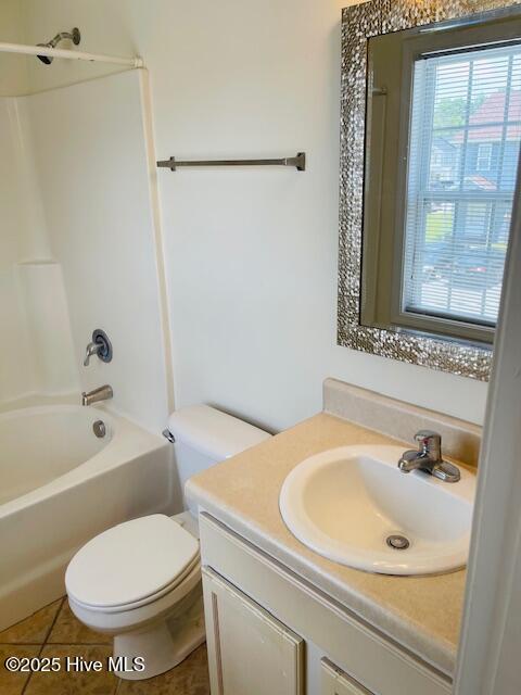 305 Comanche Trl, Havelock, NC 28532 - full bath with vanity, toilet, shower / bath combination, and tile patterned floors