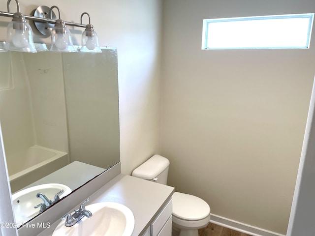 142 Witten Cir Unit A, Havelock, NC 28532 - bathroom featuring toilet, vanity, and wood finished floors