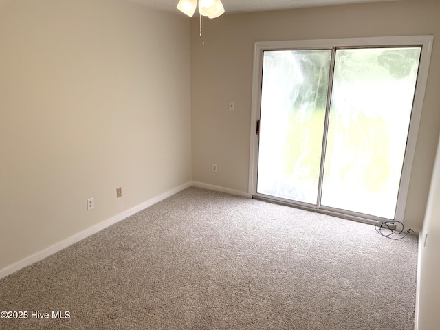 142 Witten Cir Unit A, Havelock, NC 28532 - carpeted empty room featuring baseboards and ceiling fan