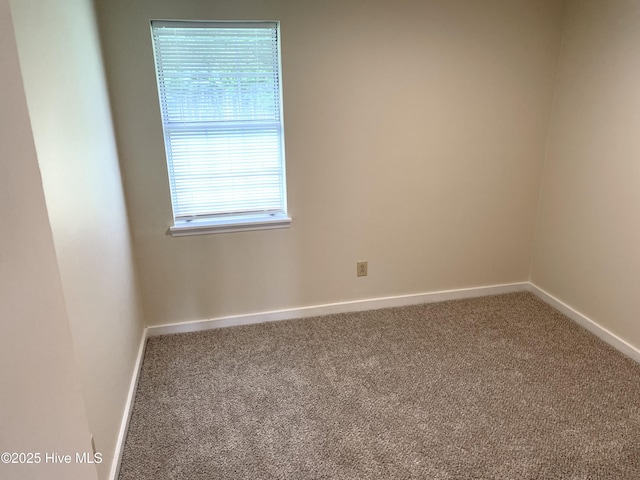 142 Witten Cir Unit A, Havelock, NC 28532 - unfurnished room featuring carpet and baseboards