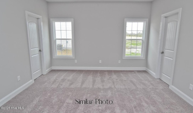 761 Regiment Rd, Jacksonville, NC 28546 - unfurnished room with baseboards and carpet floors