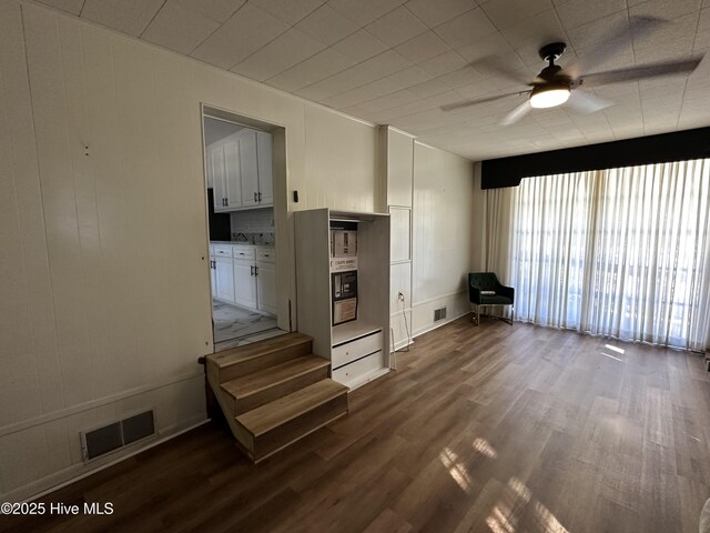 13280 Blues Farm Rd, Laurinburg, NC 28352 - living area featuring ceiling fan and wood finished floors