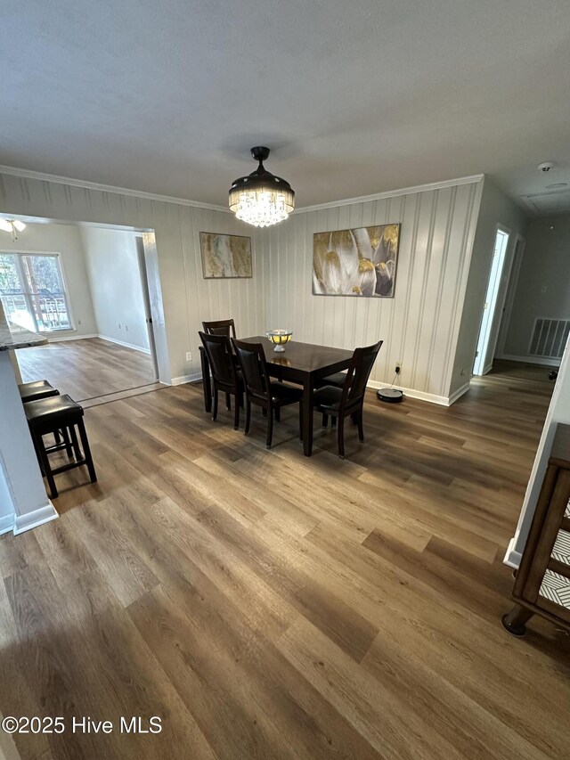 13280 Blues Farm Rd, Laurinburg, NC 28352 - living room with baseboards, dark wood-style floors, and ceiling fan with notable chandelier