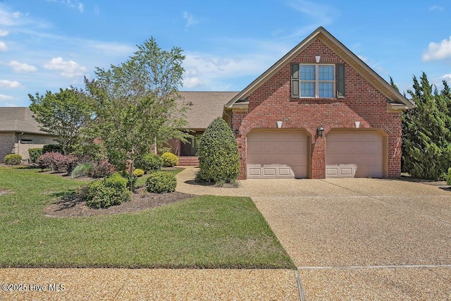 1061 Leesburg Dr, Leland, NC 28451 - view of front facade with a front lawn, driveway, brick siding, an attached garage, and a shingled roof