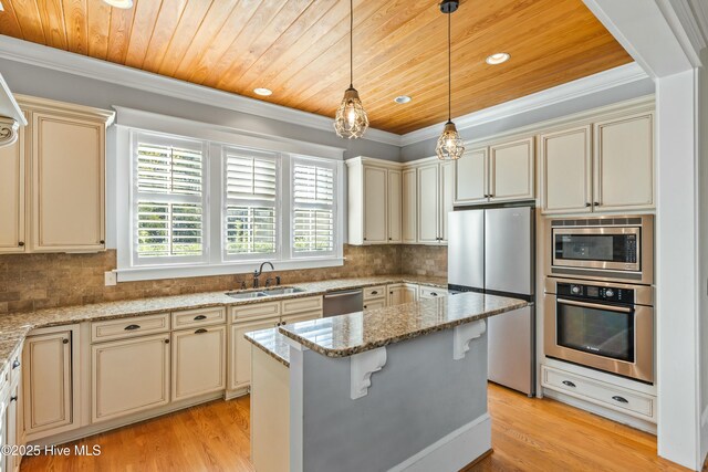 1037 Anchors Bend Way, Wilmington, NC 28411 - kitchen featuring cream cabinets, appliances with stainless steel finishes, a sink, light wood-style flooring, and wooden ceiling