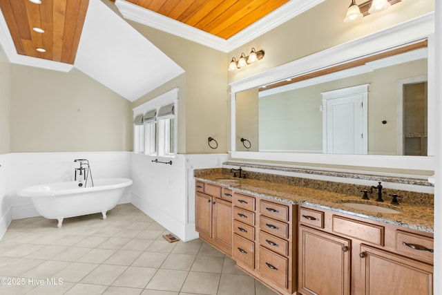 1037 Anchors Bend Way, Wilmington, NC 28411 - bathroom with crown molding, a sink, a wainscoted wall, and tile patterned flooring