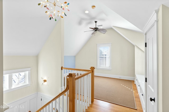 1037 Anchors Bend Way, Wilmington, NC 28411 - additional living space featuring plenty of natural light, ceiling fan with notable chandelier, lofted ceiling, and light wood-type flooring