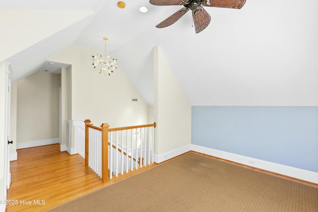 1037 Anchors Bend Way, Wilmington, NC 28411 - additional living space featuring a ceiling fan, baseboards, wood finished floors, lofted ceiling, and visible vents