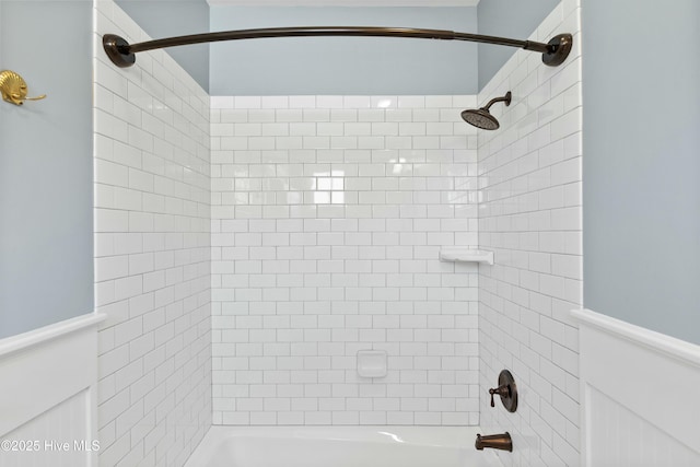 1037 Anchors Bend Way, Wilmington, NC 28411 - bathroom featuring a wainscoted wall and shower / bathtub combination