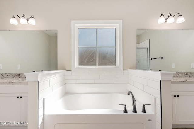 30 Tee Dr, Selma, NC 27576 - bathroom with a garden tub and two vanities