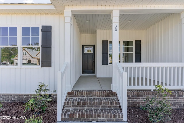 30 Tee Dr, Selma, NC 27576 - view of exterior entry with a porch