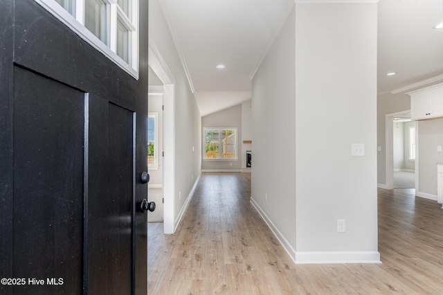 30 Tee Dr, Selma, NC 27576 - entrance foyer with light wood finished floors, baseboards, recessed lighting, and crown molding