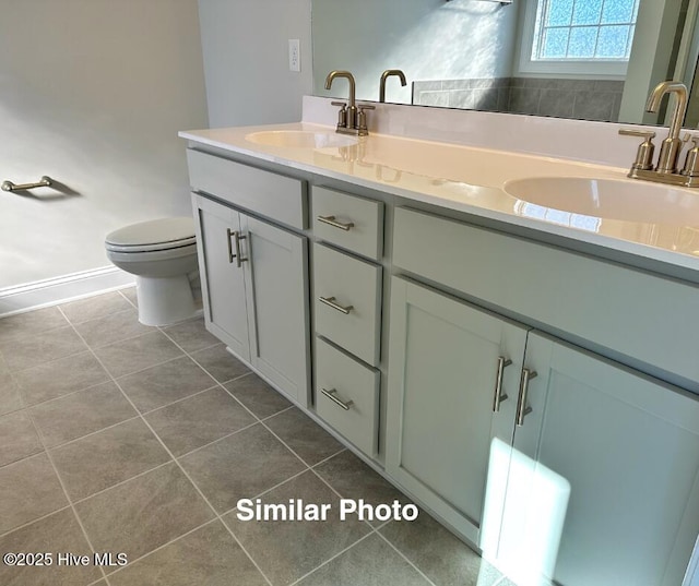 745 Secession Ln, Jacksonville, NC 28546 - bathroom with double vanity, a sink, and tile patterned floors