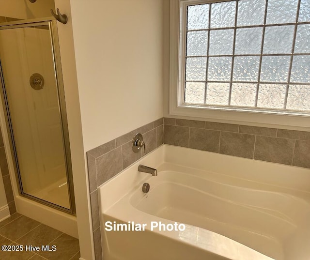 745 Secession Ln, Jacksonville, NC 28546 - full bathroom featuring tile patterned flooring, a stall shower, and a bath