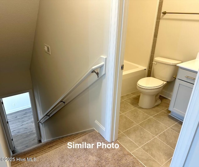 745 Secession Ln, Jacksonville, NC 28546 - full bath featuring baseboards, toilet, tile patterned flooring, and vanity