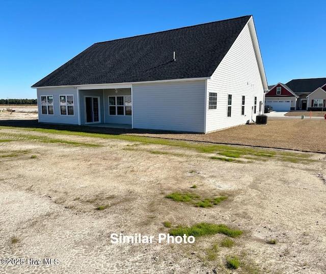 745 Secession Ln, Jacksonville, NC 28546 - back of house featuring central air condition unit