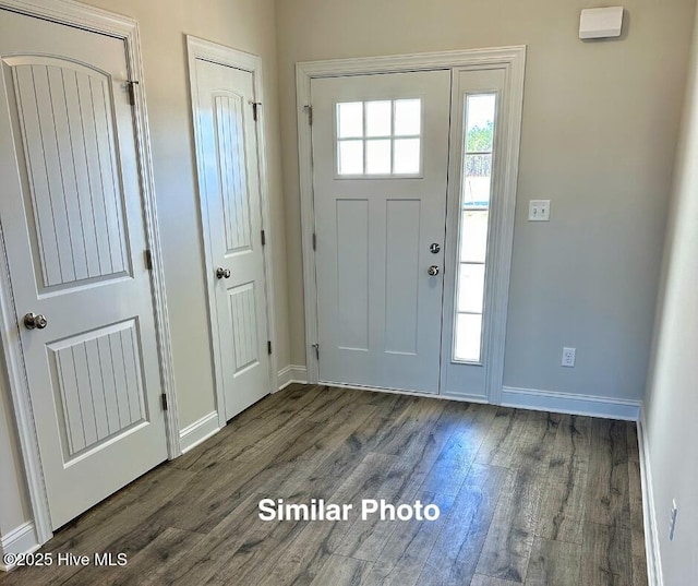 745 Secession Ln, Jacksonville, NC 28546 - entryway featuring baseboards and wood finished floors