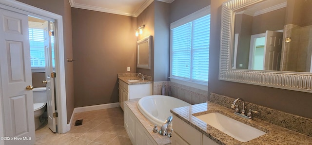 2429 Falls River Ave, Raleigh, NC 27614 - bathroom featuring ornamental molding, a bath, two vanities, and tile patterned floors