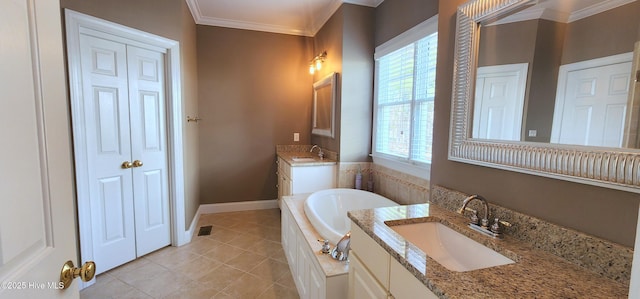 2429 Falls River Ave, Raleigh, NC 27614 - bathroom featuring ornamental molding, a bath, plenty of natural light, two vanities, and tile patterned floors