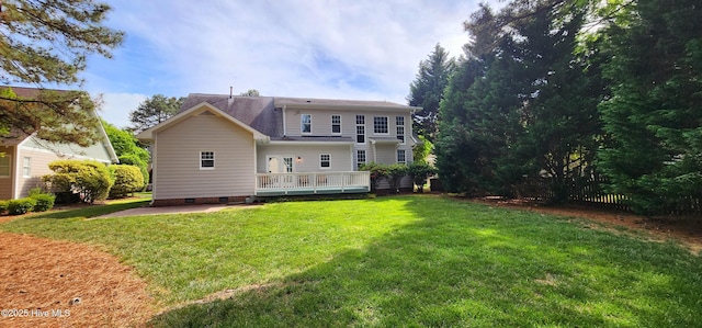 2429 Falls River Ave, Raleigh, NC 27614 - rear view of property with a wooden deck, a yard, and crawl space