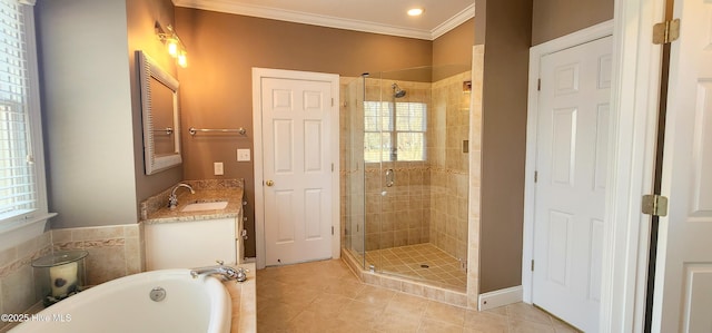 2429 Falls River Ave, Raleigh, NC 27614 - full bathroom featuring a shower stall, tile patterned floors, healthy amount of natural light, crown molding, and a bath