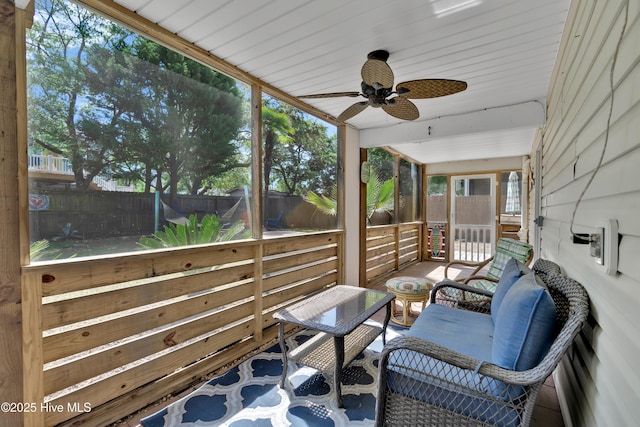 222 NE 36th St, Oak Island, NC 28465 - sunroom / solarium with a healthy amount of sunlight and a ceiling fan