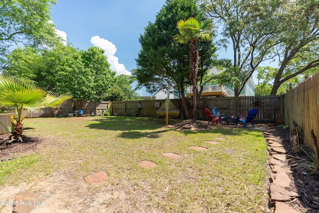 222 NE 36th St, Oak Island, NC 28465 - view of yard featuring a fenced backyard