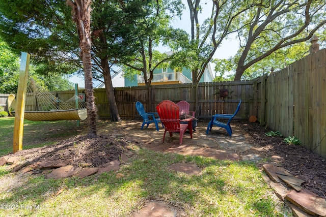 222 NE 36th St, Oak Island, NC 28465 - view of yard with a fenced backyard