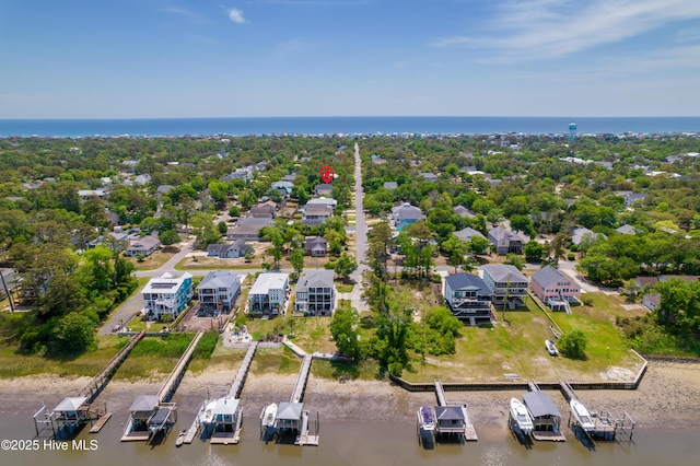 222 NE 36th St, Oak Island, NC 28465 - aerial view featuring a water view and a residential view