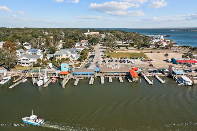 222 NE 36th St, Oak Island, NC 28465 - drone / aerial view featuring a water view