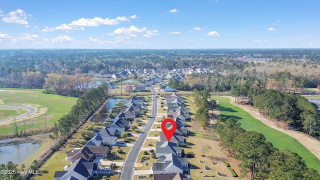 659 Meadowbrook Ln NW, Calabash, NC 28467 - aerial view of property and surrounding area featuring nearby suburban area and a large body of water