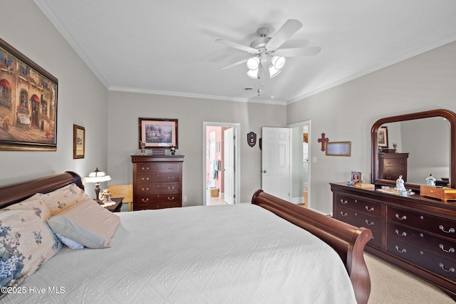 carpeted bedroom with crown molding, connected bathroom, and ceiling fan
