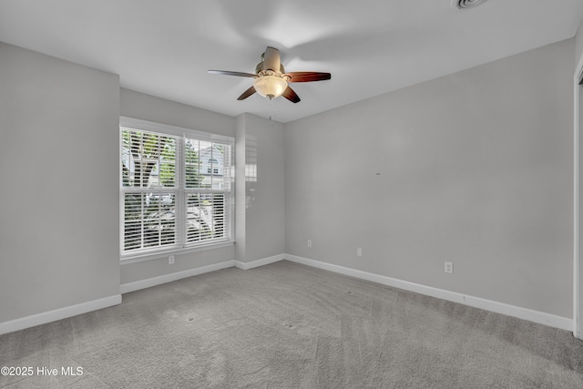 6211 Wrightsville Ave Unit 111, Wilmington, NC 28403 - spare room featuring ceiling fan and carpet floors