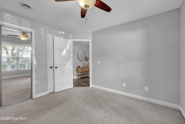 6211 Wrightsville Ave Unit 111, Wilmington, NC 28403 - unfurnished bedroom featuring carpet flooring and ceiling fan