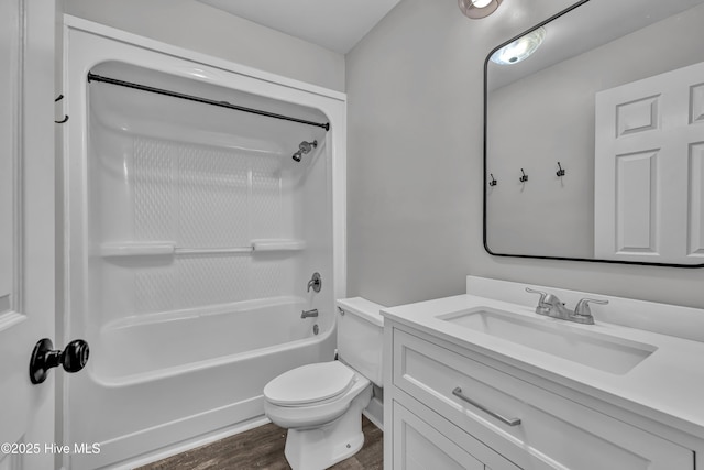 6211 Wrightsville Ave Unit 111, Wilmington, NC 28403 - full bath with vanity, wood finished floors, and shower / washtub combination