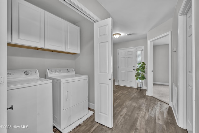6211 Wrightsville Ave Unit 111, Wilmington, NC 28403 - laundry area with cabinet space, independent washer and dryer, and dark wood-style floors