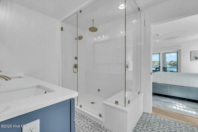 7522 Dunbar Rd, Wilmington, NC 28411 - bathroom with a stall shower, ensuite bath, and double vanity