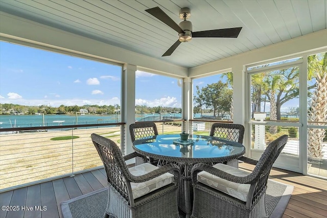 7522 Dunbar Rd, Wilmington, NC 28411 - sunroom with a water view, ceiling fan, wood-type flooring, and outdoor dining space
