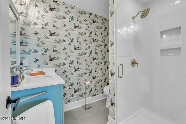 7522 Dunbar Rd, Wilmington, NC 28411 - full bathroom with a stall shower, vanity, wallpapered walls, and tile patterned floors