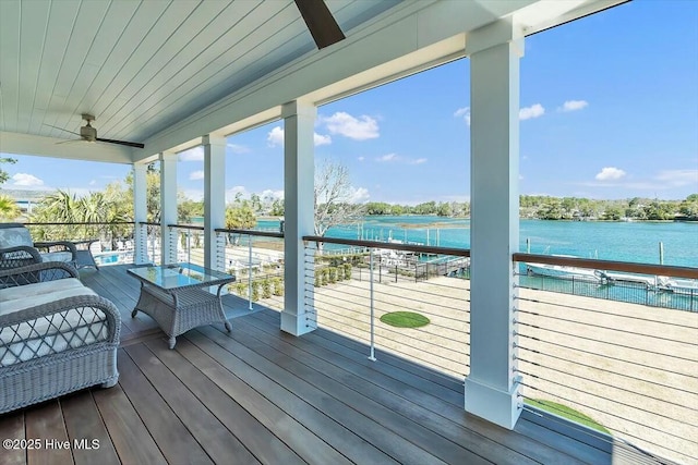 7522 Dunbar Rd, Wilmington, NC 28411 - deck featuring a ceiling fan and a water view