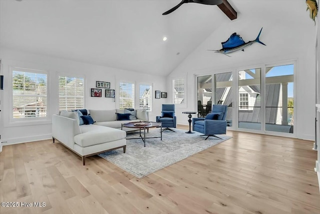 7522 Dunbar Rd, Wilmington, NC 28411 - living room featuring high vaulted ceiling, healthy amount of natural light, light wood-type flooring, ceiling fan, and beamed ceiling
