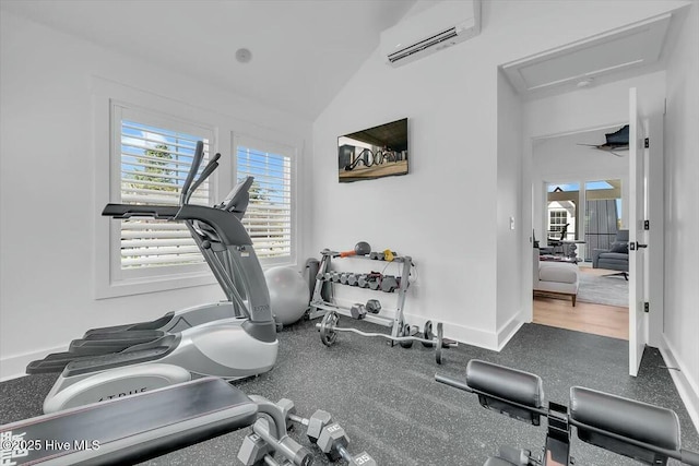 7522 Dunbar Rd, Wilmington, NC 28411 - workout area featuring a wall unit AC, attic access, and lofted ceiling
