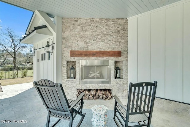 7522 Dunbar Rd, Wilmington, NC 28411 - view of patio / terrace featuring an outdoor fireplace